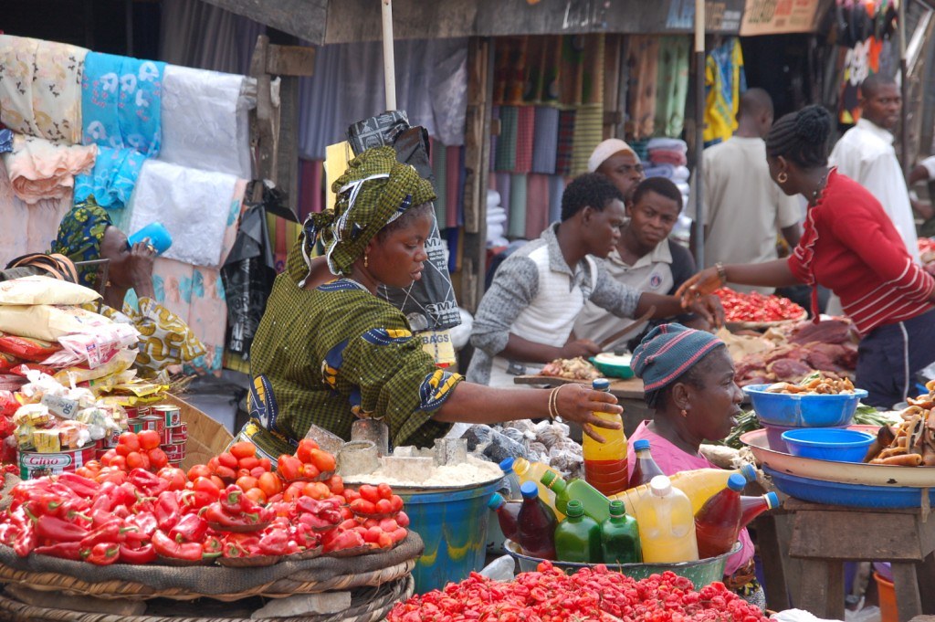 People at a fruit and vegetable market in Nigeria